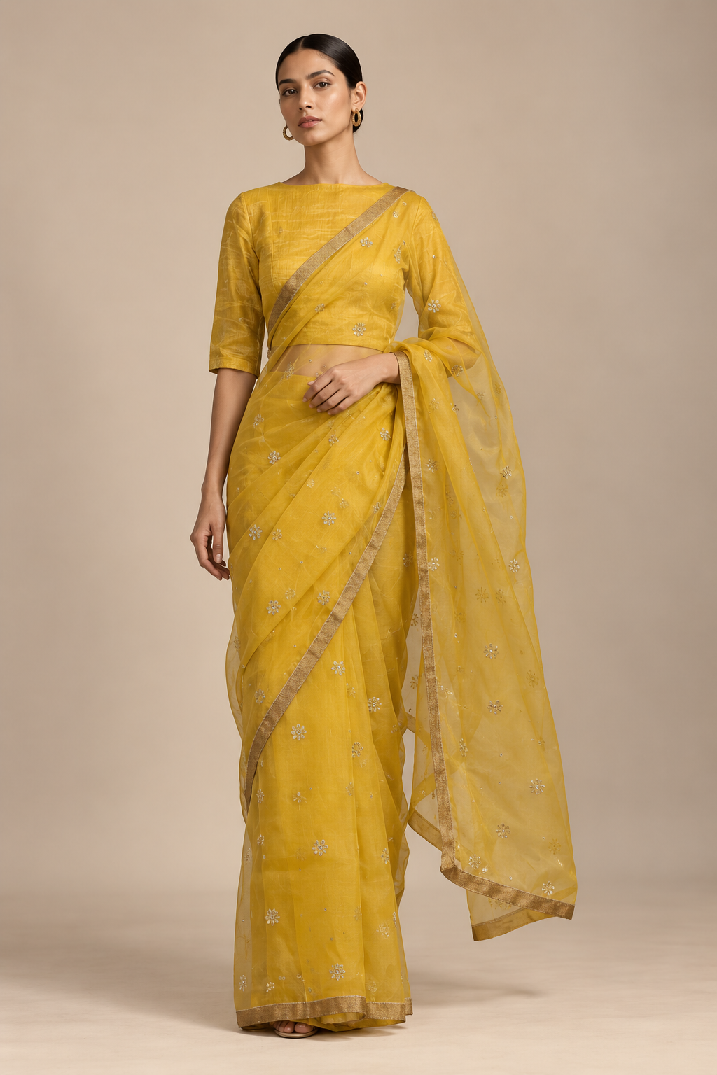 Yellow embroidered organza saree