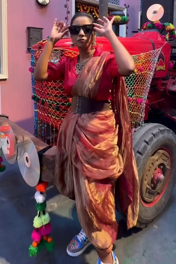 Shilpa Rao in Maroon Solid Tissue Saree