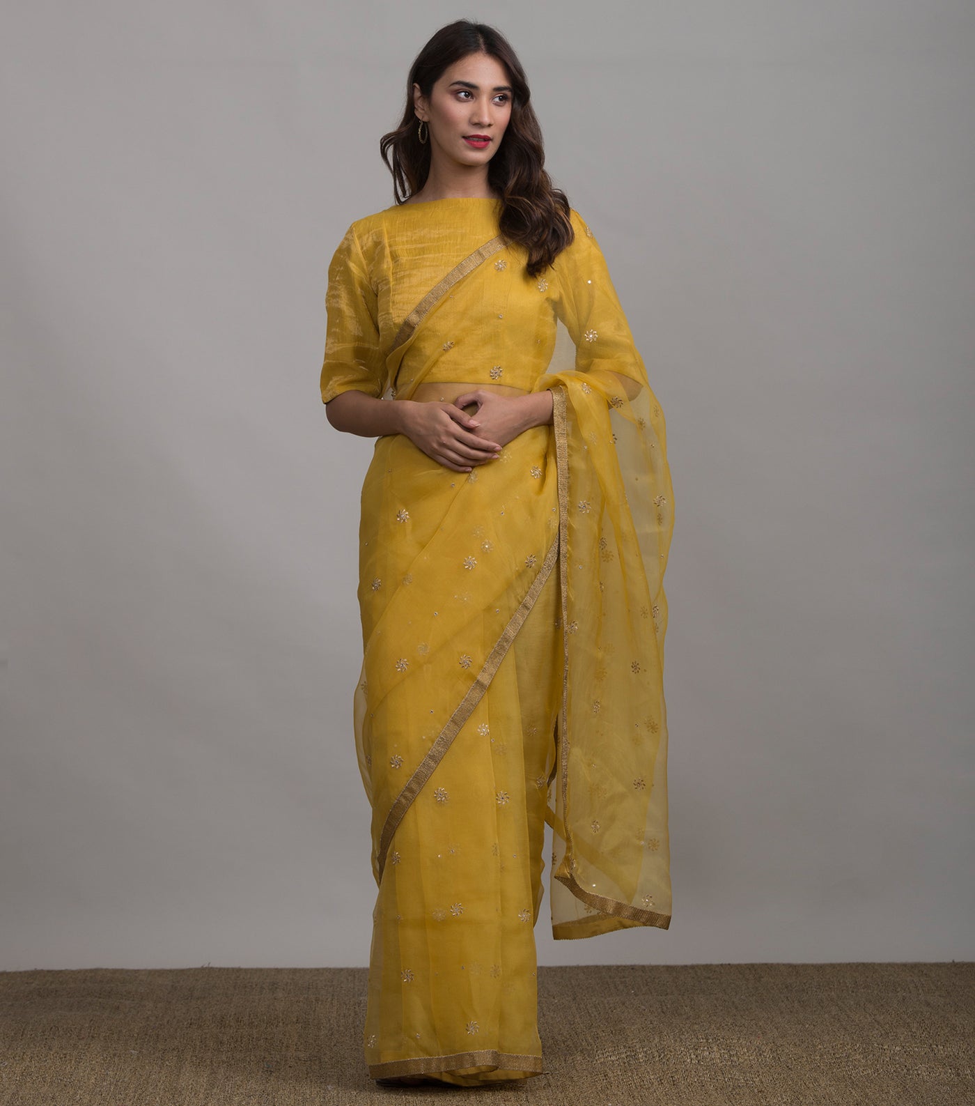 Yellow embroidered organza saree