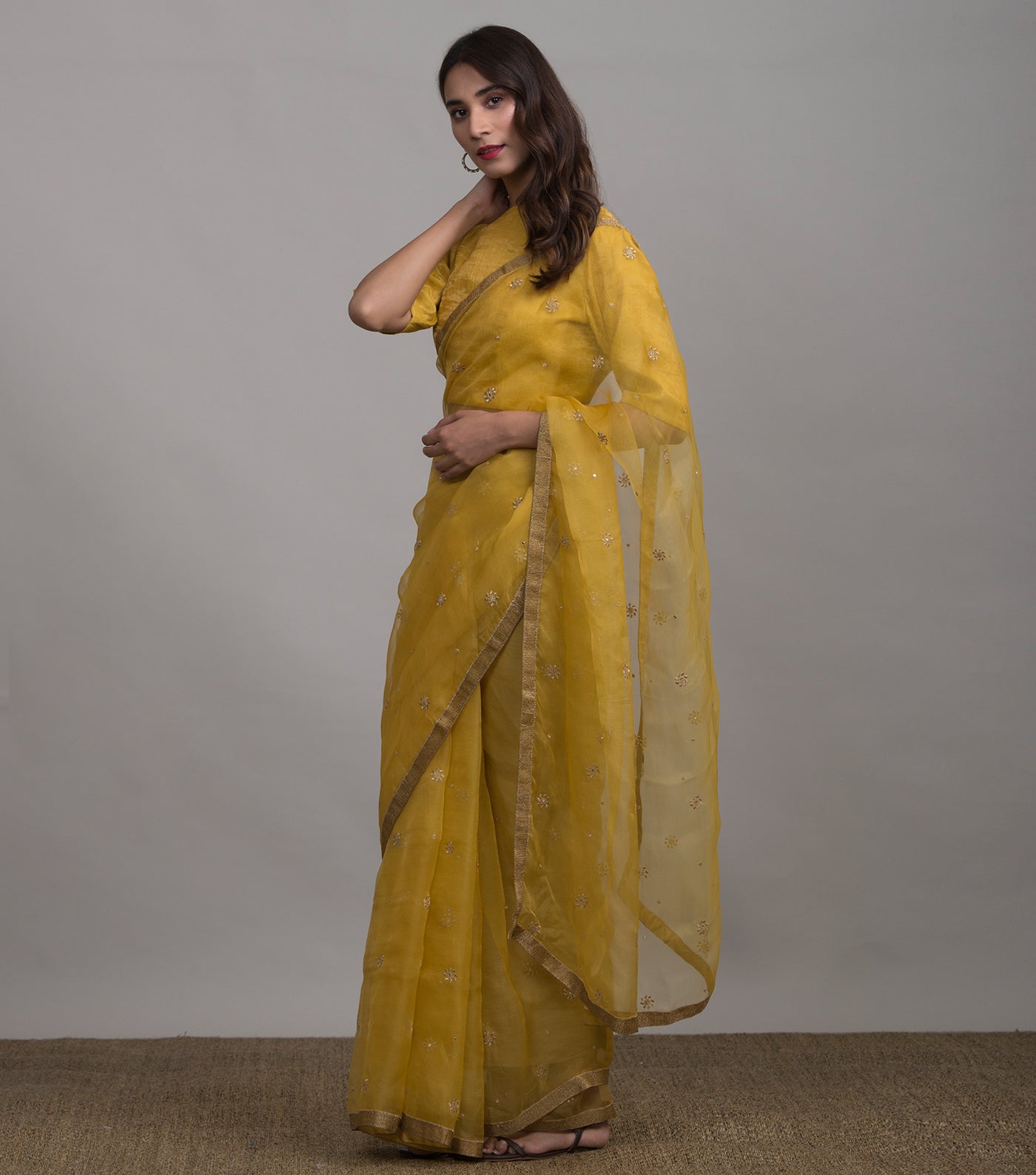 Yellow embroidered organza saree