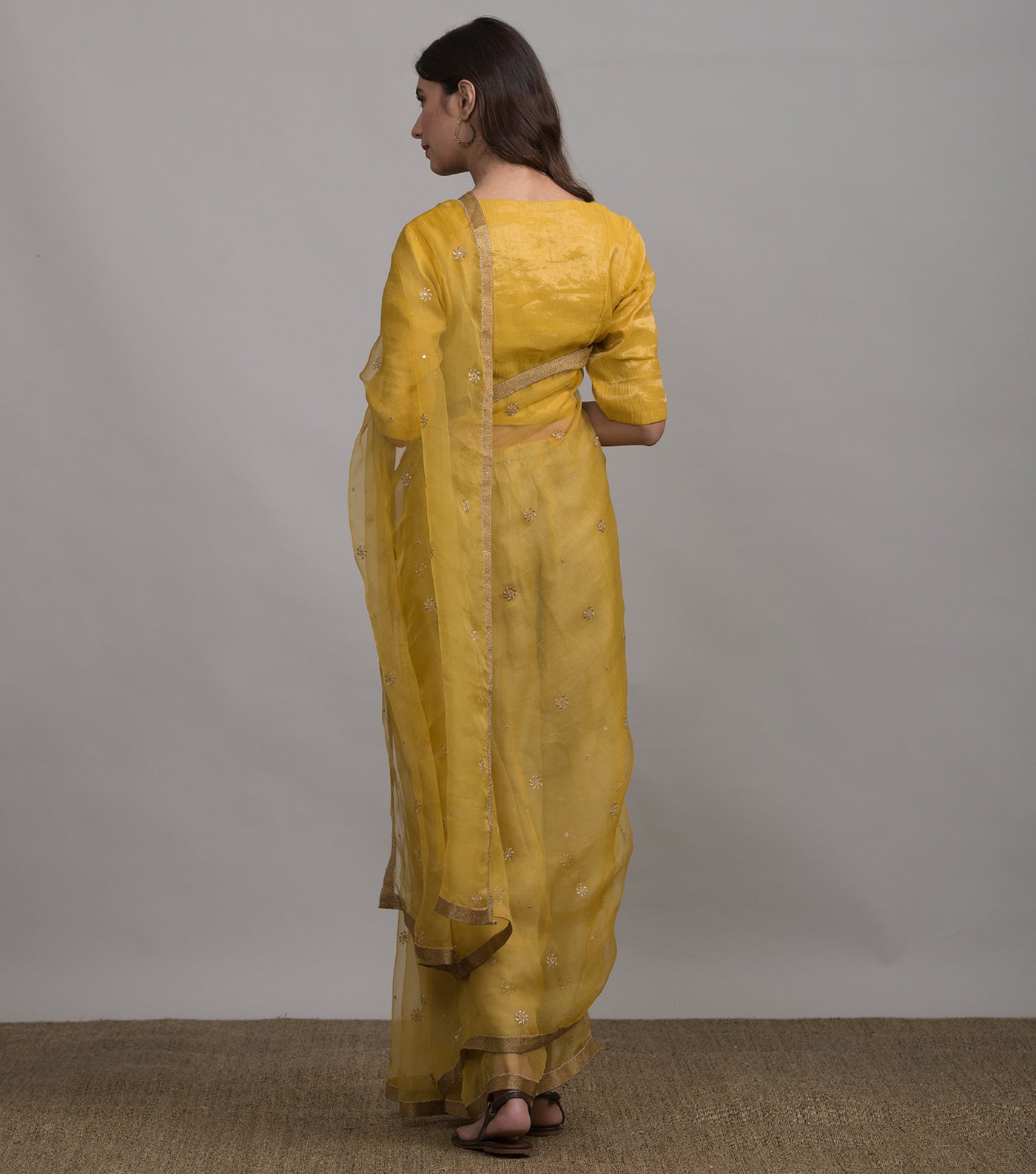 Yellow embroidered organza saree