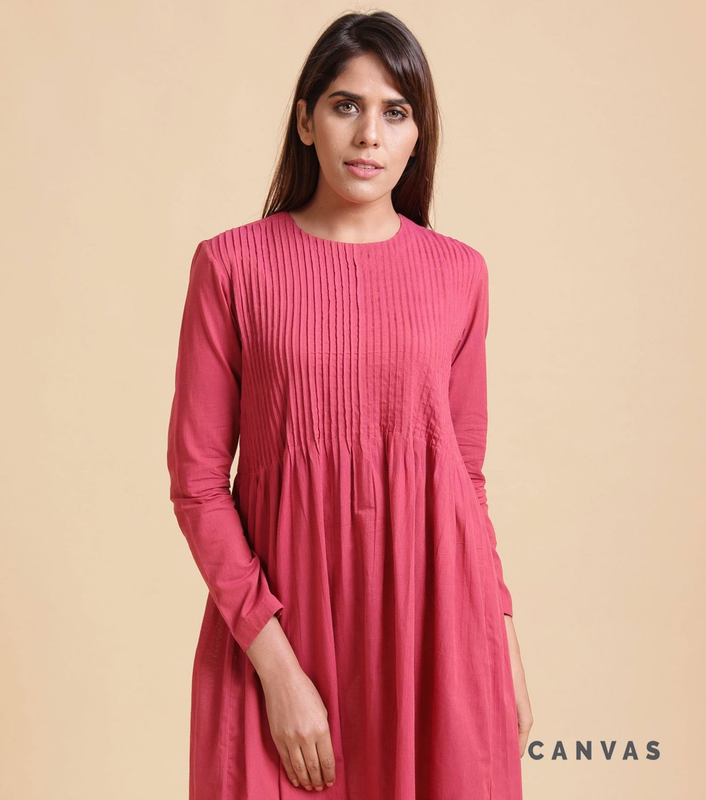 Pink pleated cotton dress